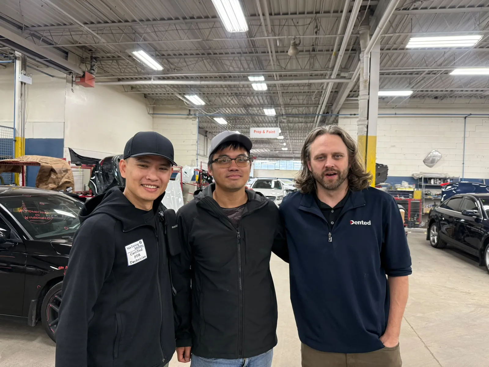Jay Ma、Leo 與 Josh 在 Assured Automotive 合影